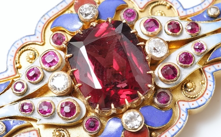 A fine Victorian Renaissance Revival tourmaline, diamond, ruby and enamel brooch, late 19th century